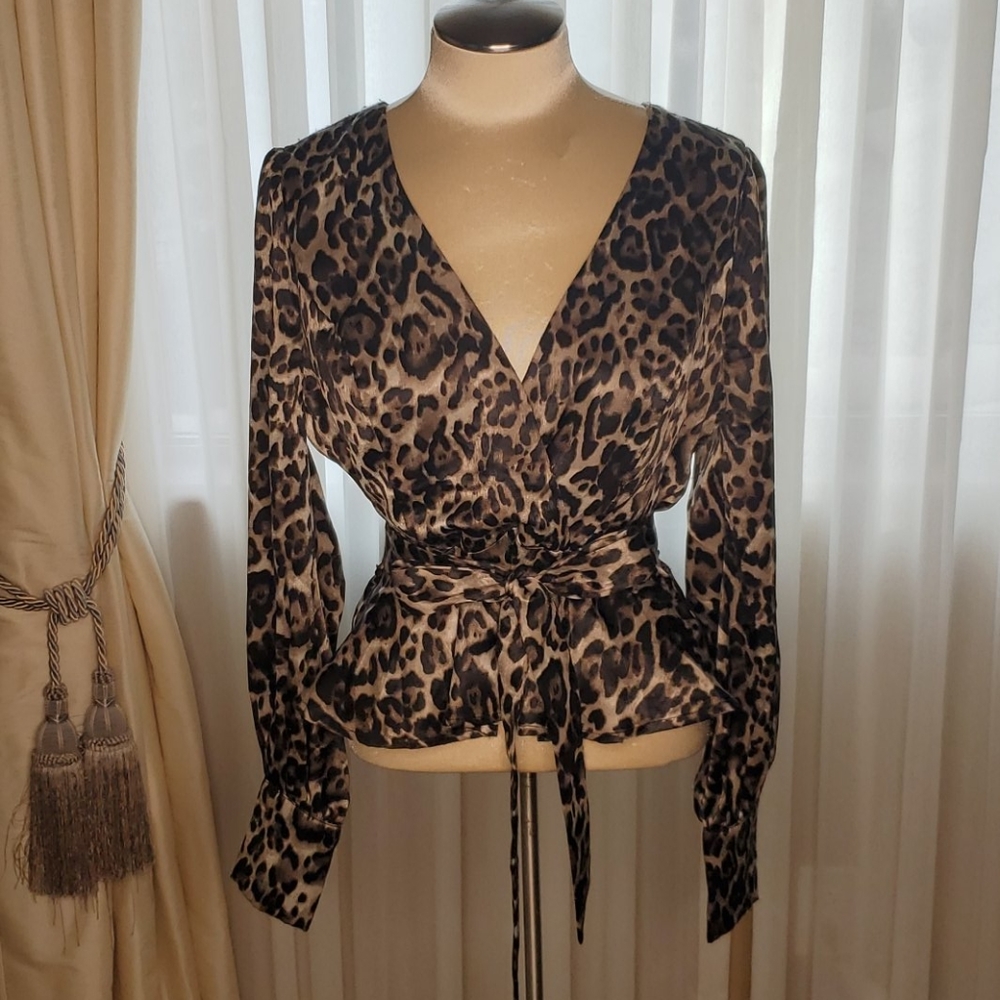 NWOT Animal print peplum top